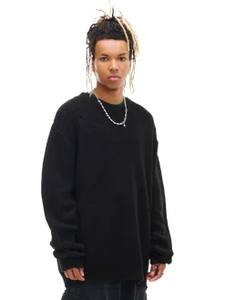 Żakardowy sweter ze strzępieniami