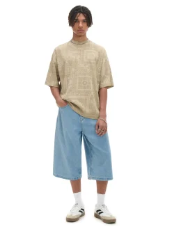 Beżowa koszulka z nadrukiem all over