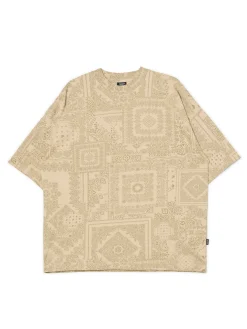 Beżowa koszulka z nadrukiem all over