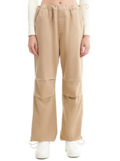 Beżowe jeansy parachute