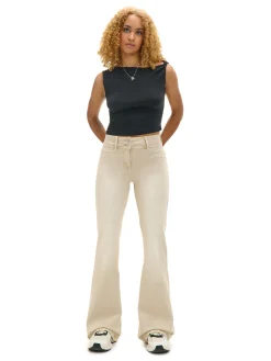 Beżowe spodnie flare z efektem sprania