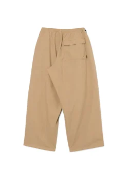 Beżowe spodnie parachute