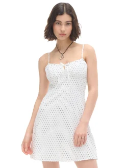 Biała sukienka w groszki