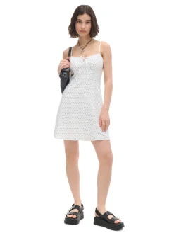 Biała sukienka w groszki