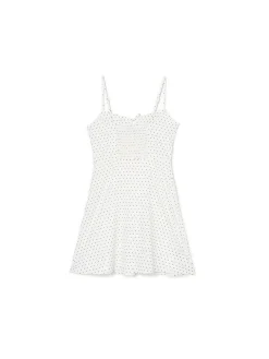 Biała sukienka w groszki