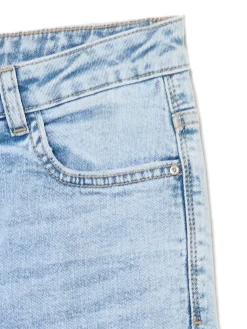 Błękitne jeansy skinny z przetarciami