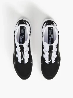 Czarno-białe sneakersy z odblaskowymi detalami