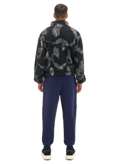 Granatowe dresowe joggery z nadrukiem na nogawce