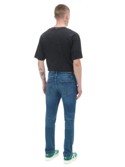 Granatowe jeansy slim