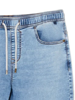 Jeansy jogger z ozdobnymi przeszyciami