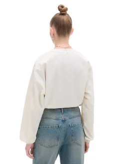 Kremowa bluzka z nadrukiem i regulacją