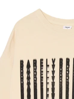 Kremowa koszulka oversize z nadrukiem