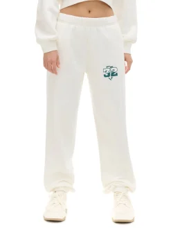 Kremowe dresowe joggery z naszywką