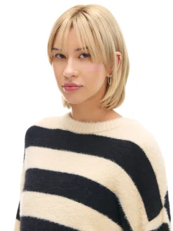 Kremowy sweter w czarne paski