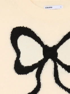 Kremowy sweter ze wstążką