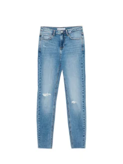 Niebieskie jeansy skinny z przetarciami