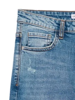 Niebieskie jeansy skinny z przetarciami