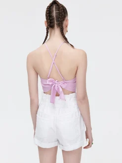 Różowy crop top z ozdobnym wiązaniem