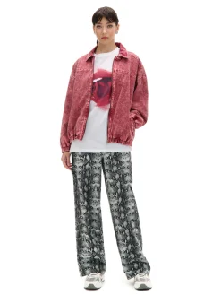 Spodnie baggy z wężowym motywem