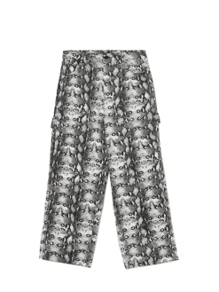 Spodnie baggy z wężowym motywem