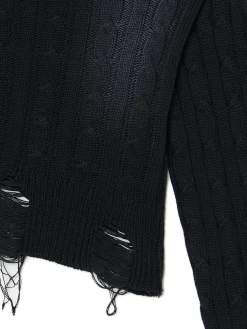 Sweter z miejscowym efektem wybielenia