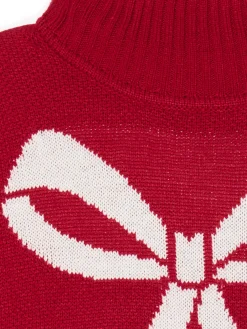 Świąteczny sweter z kokardką