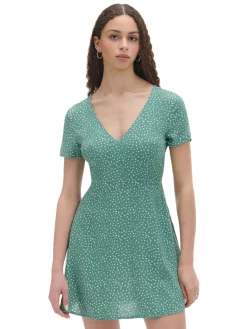 Zielona sukienka mini w stokrotki
